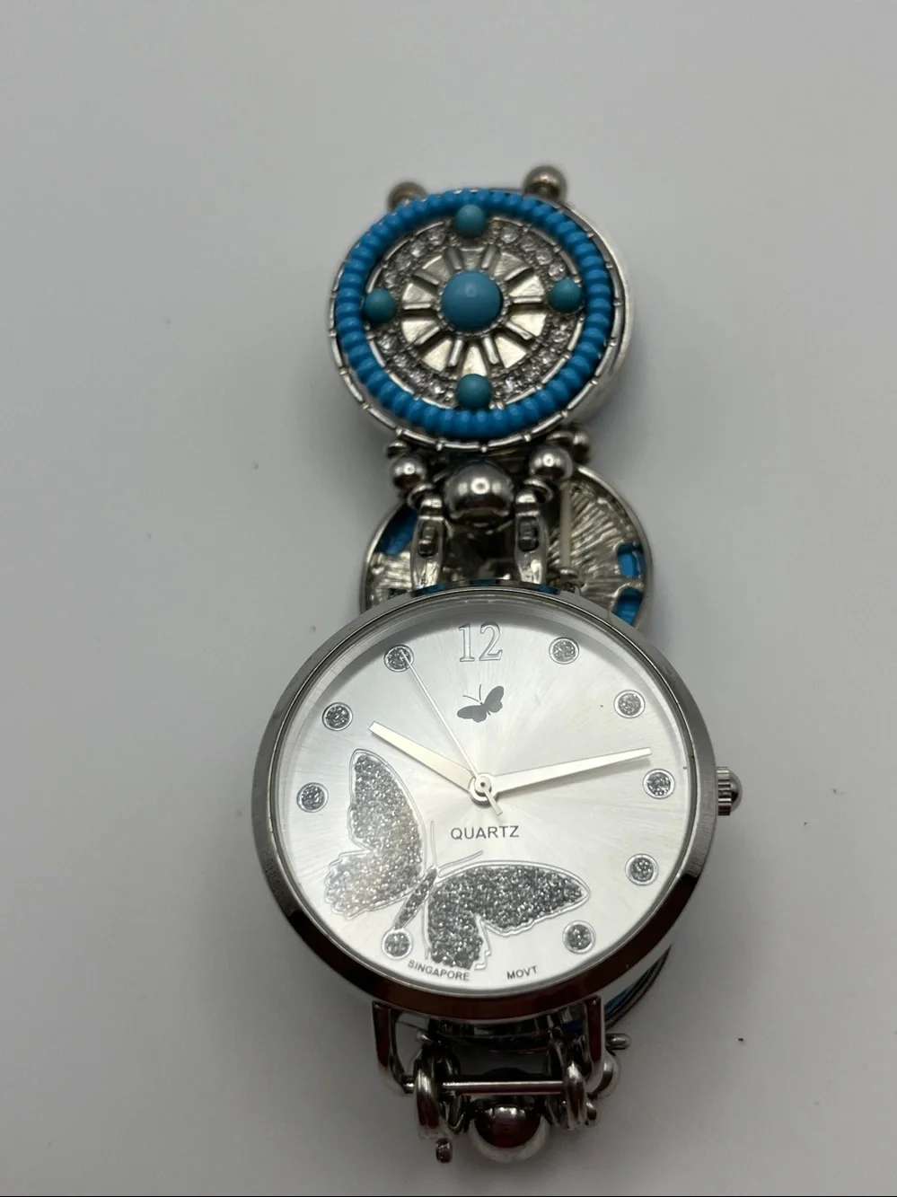Silver Butterfly Quartz Watch with Turquoise Accents